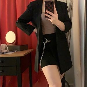 Black skirt with chain belt